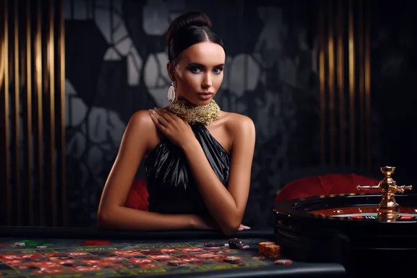 A stylish woman beside vibrant slot machines displaying glowing sevens, showcasing the variety of top slots at WIN7JILI.